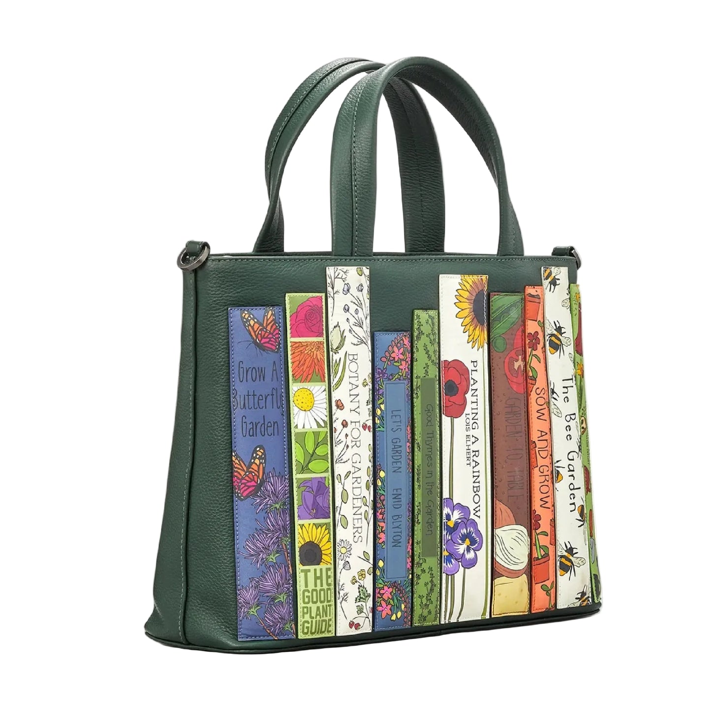 Green handbag with colorful book-themed panels on a white background