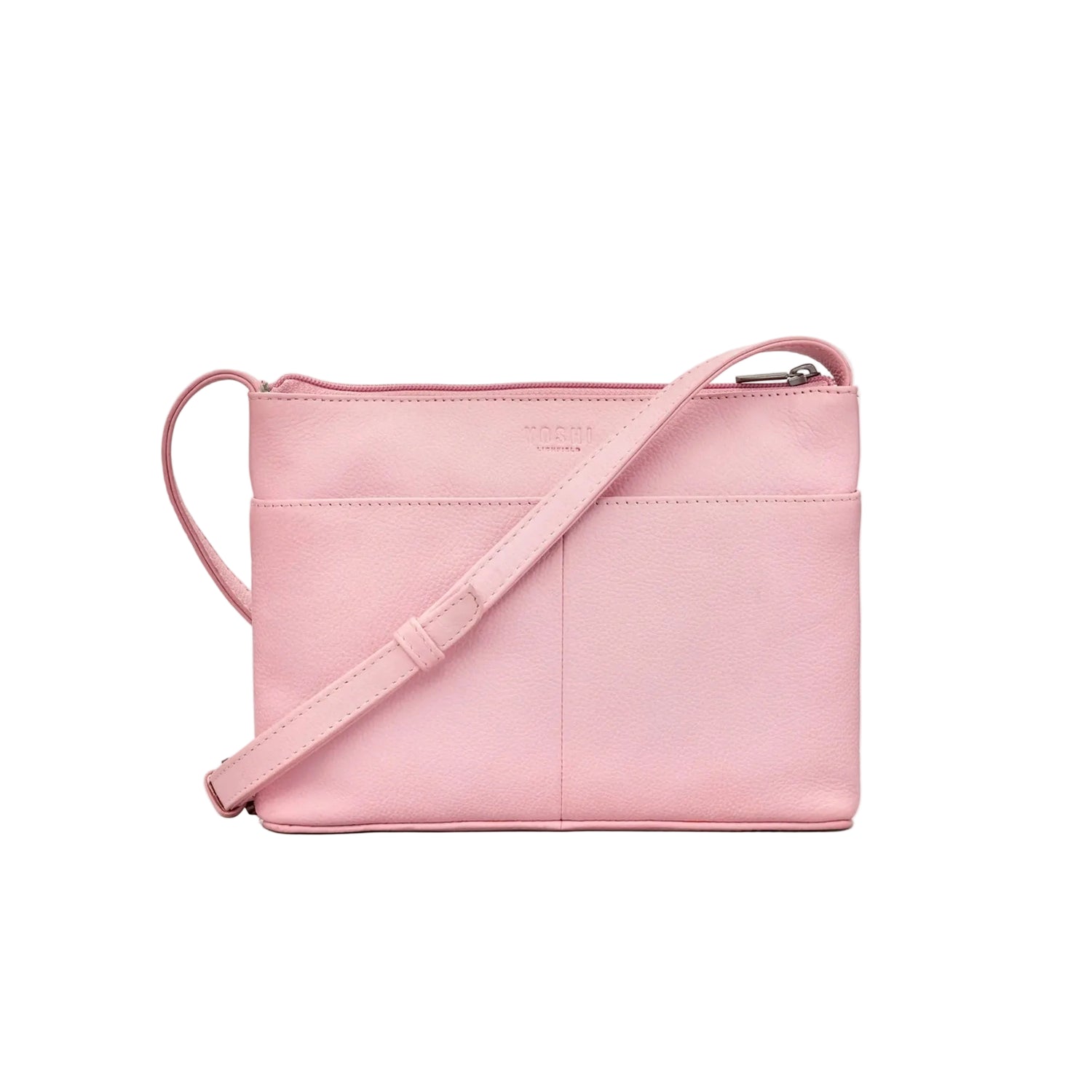 Pink crossbody bag on a white background